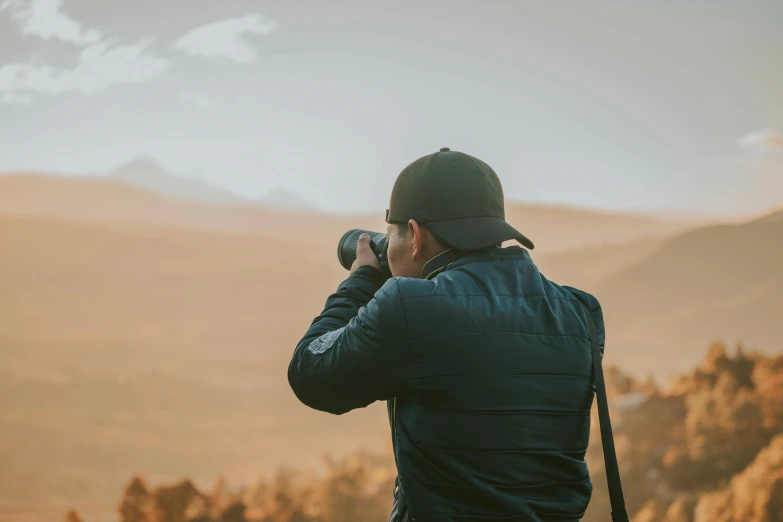 a person wearing a jacket looking out into the distance