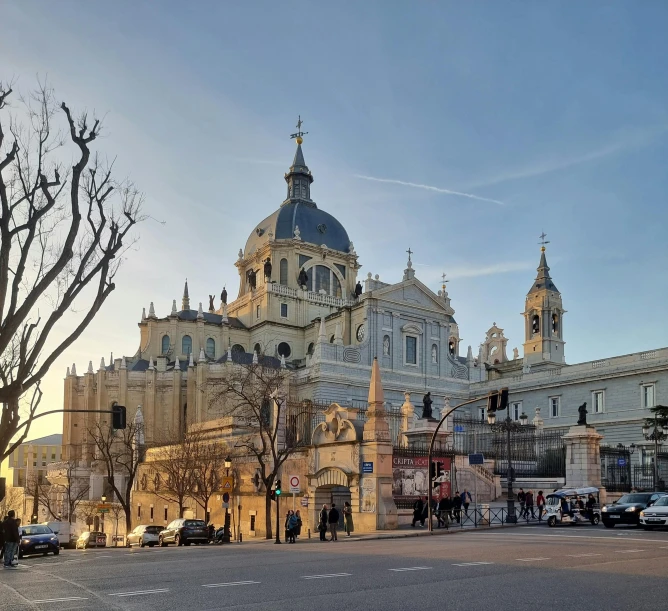 a large church with several spires and a domed building near it