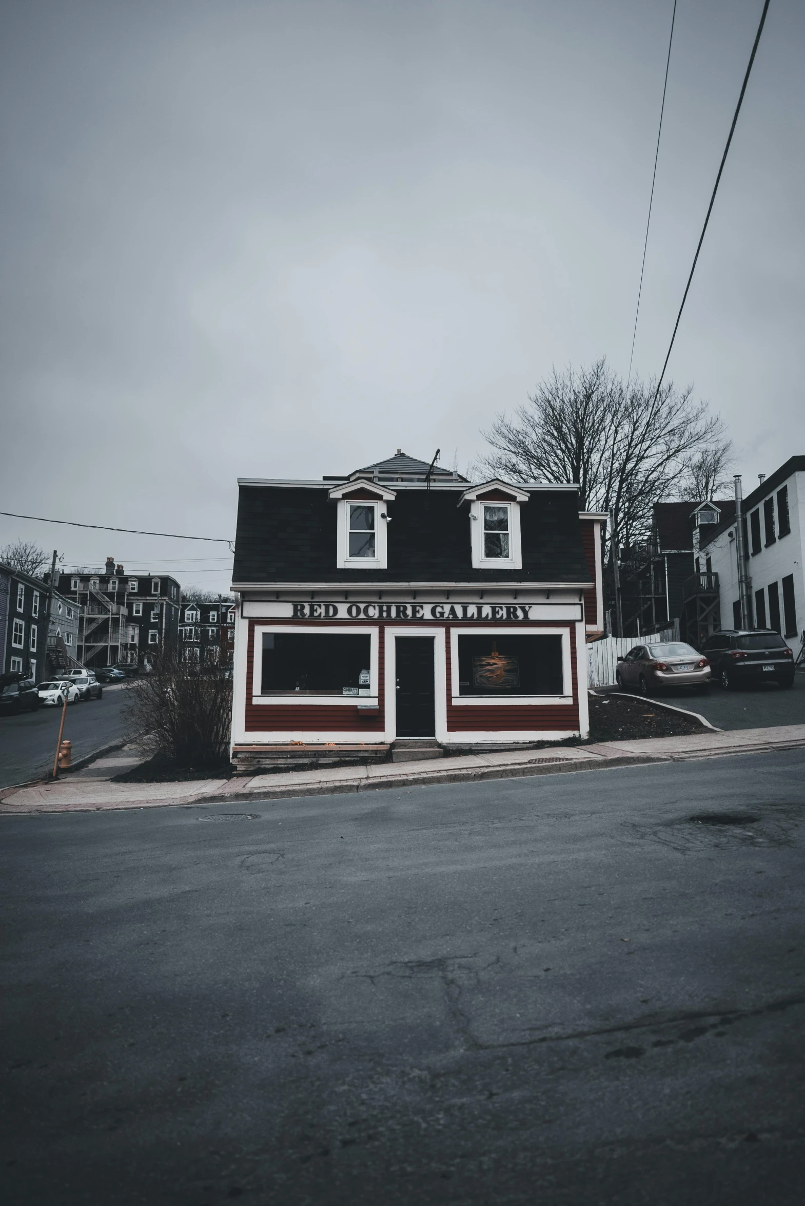 small store on side of street with old style decor