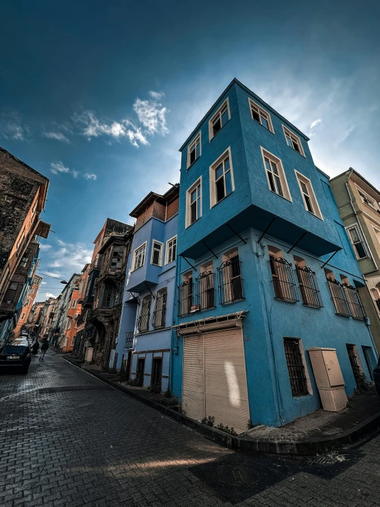 several colorful buildings sit near each other