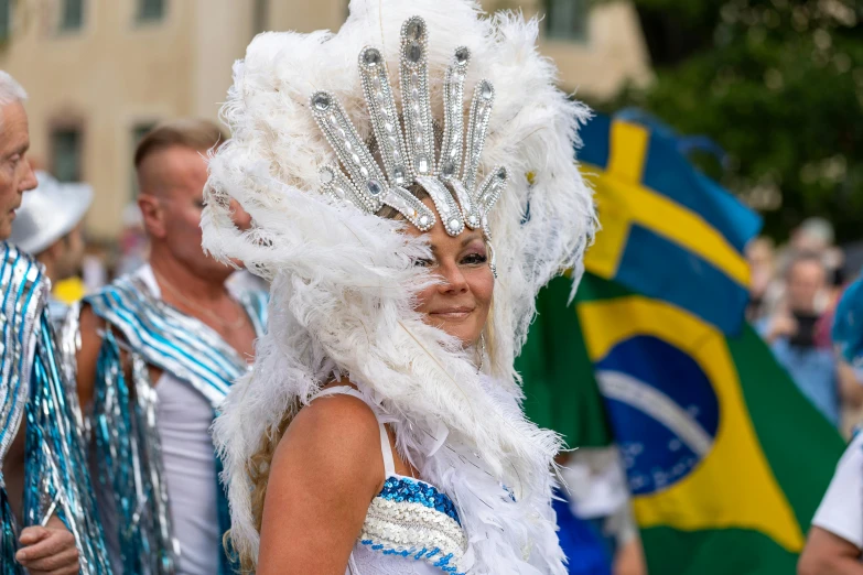 woman in a carnival costume at the end of a parade