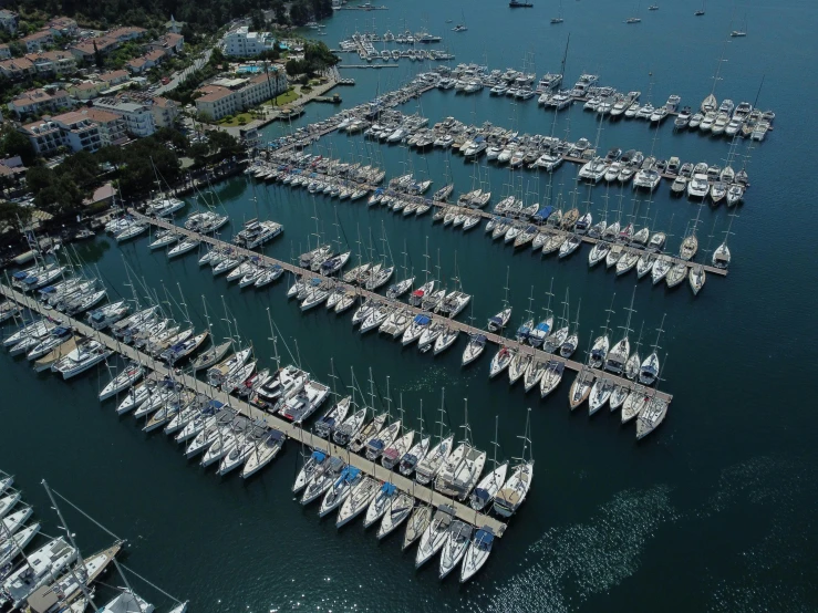 the boats are all parked in the marina