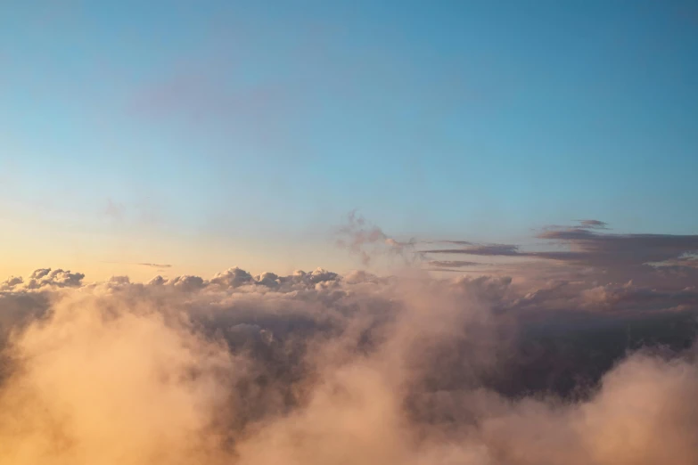 a bunch of clouds and the sky are seen