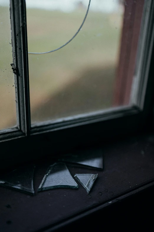 two triangles are shown on a window sill