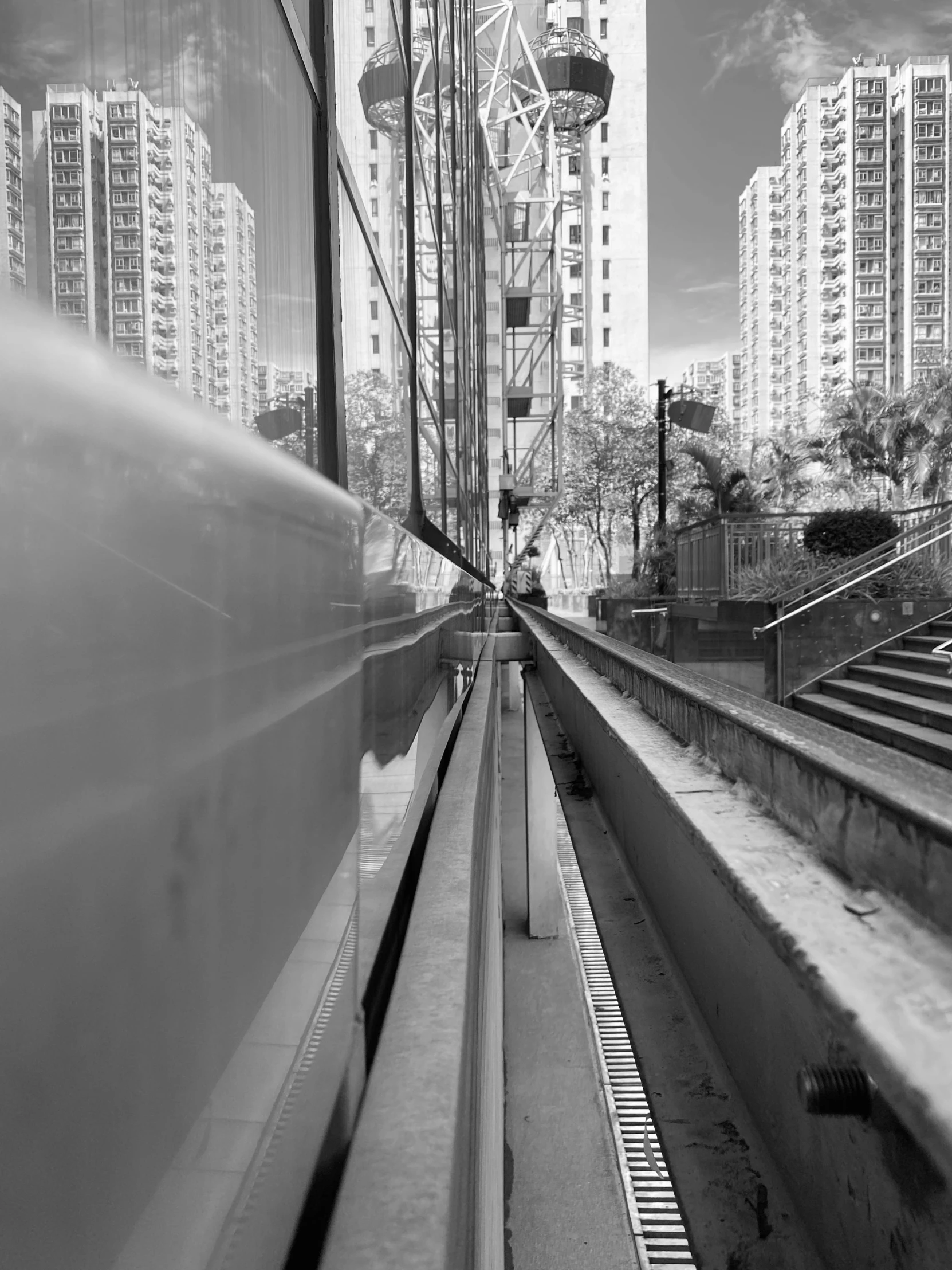 an empty area with several tall buildings in the distance