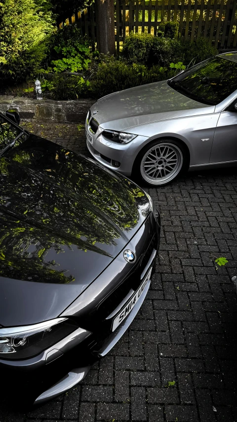 two cars parked in front of each other