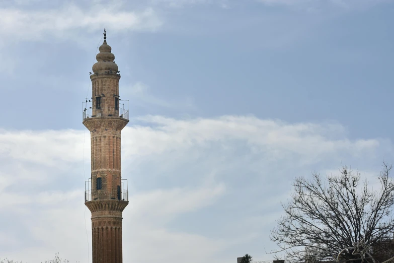 a large clock tower towering over a city