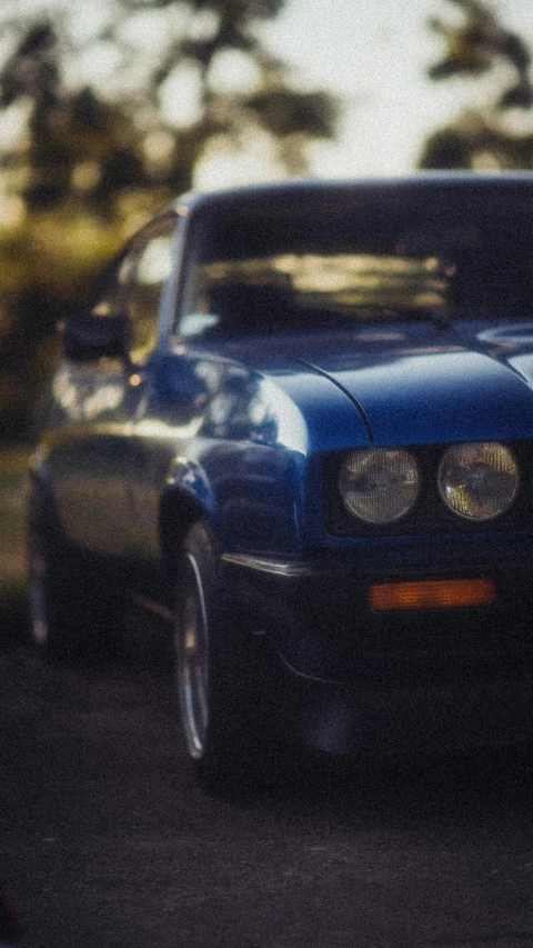 a black bmw is seen driving down a city street