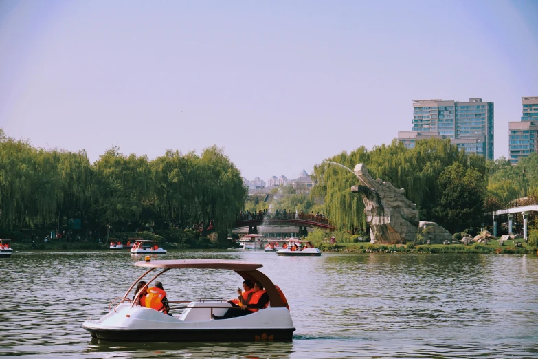 a small boat with two people on it