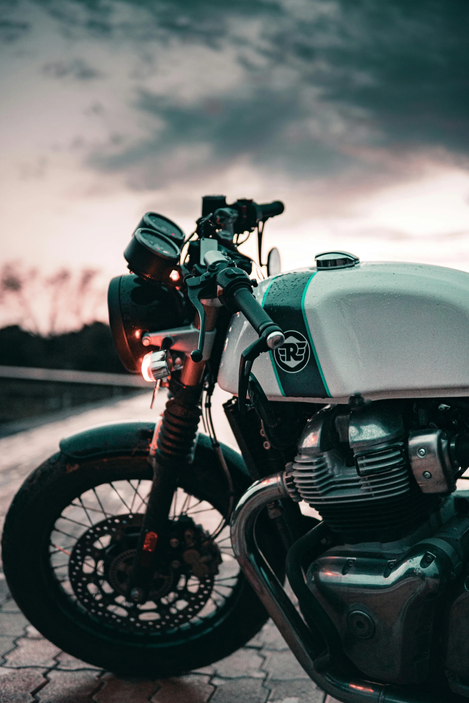 a motorcycle parked on the side of the road