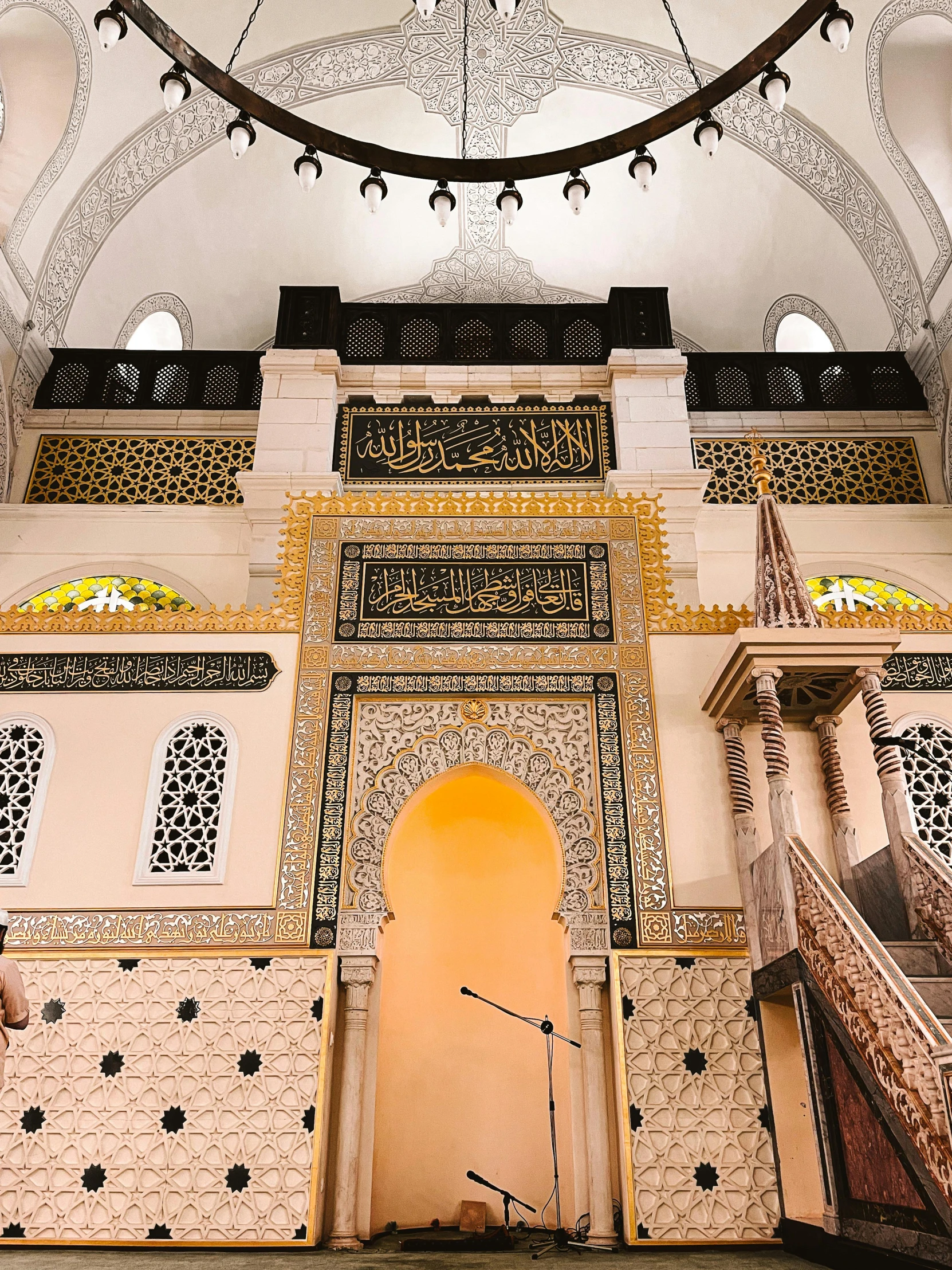 ornate wall carvings surround the entrance of an ornate, elaborate building