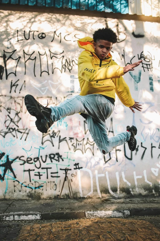 a man is in mid air while jumping on his skateboard