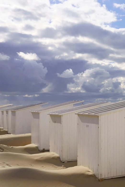 a group of white buildings sitting next to each other