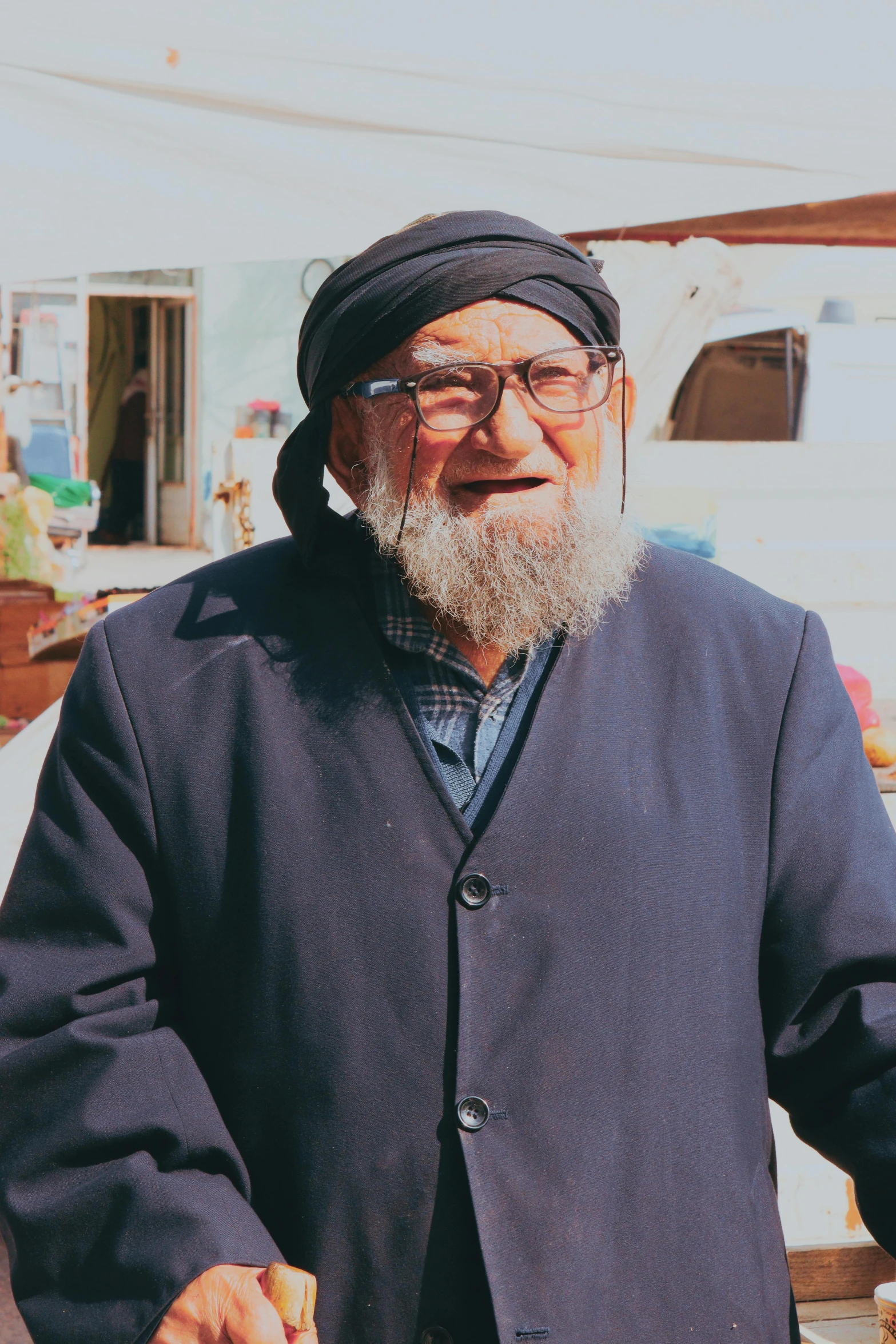 a man in blue holding onto some food