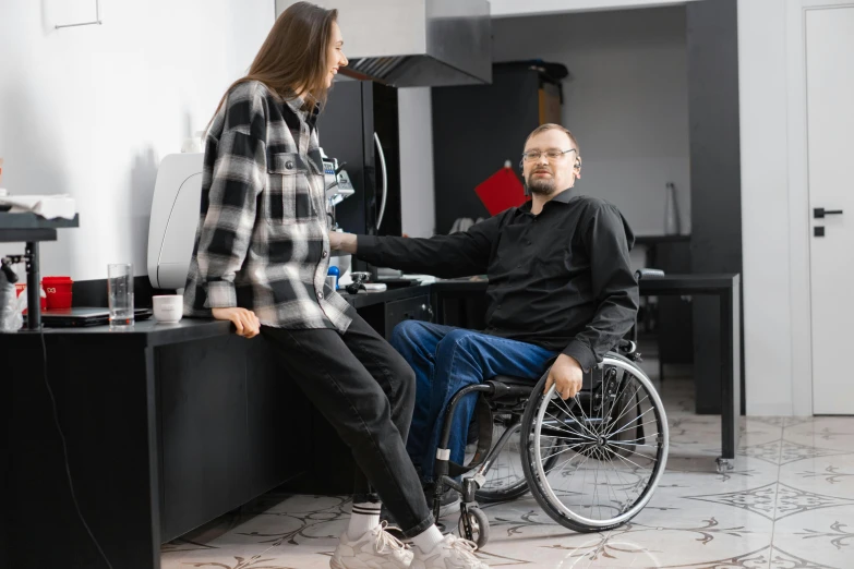 an individual is in a wheelchair inside of a room