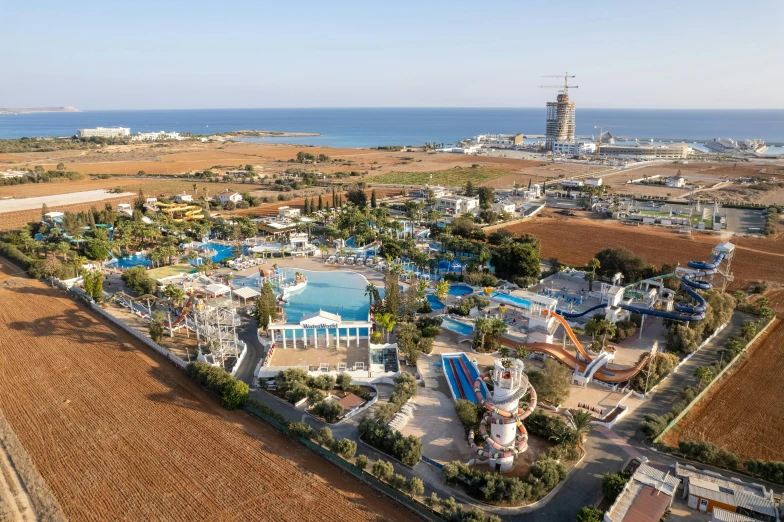 an aerial view of the seafront and park