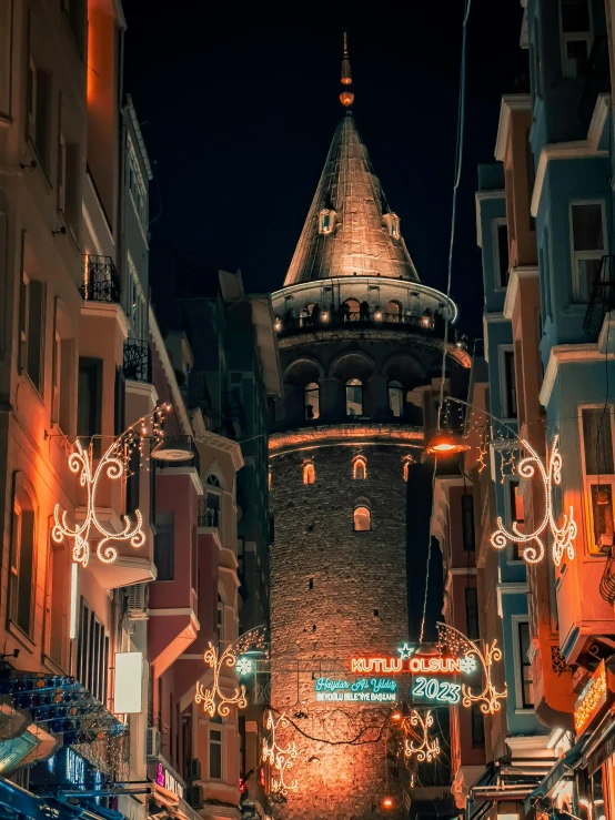 an old brick building has lit up christmas lights