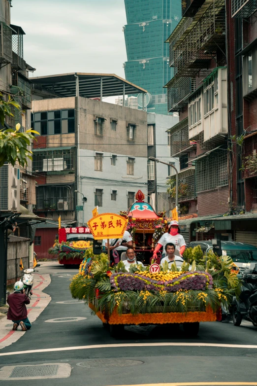 a float in the middle of a busy city street