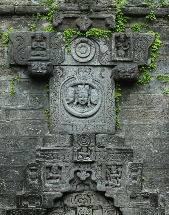 a close - up s of the face and wall of an ancient building