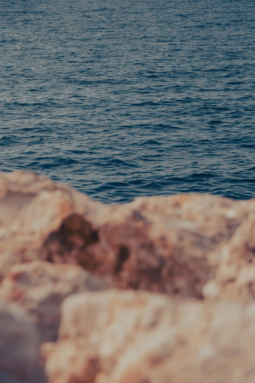 an image of a man riding a surfboard