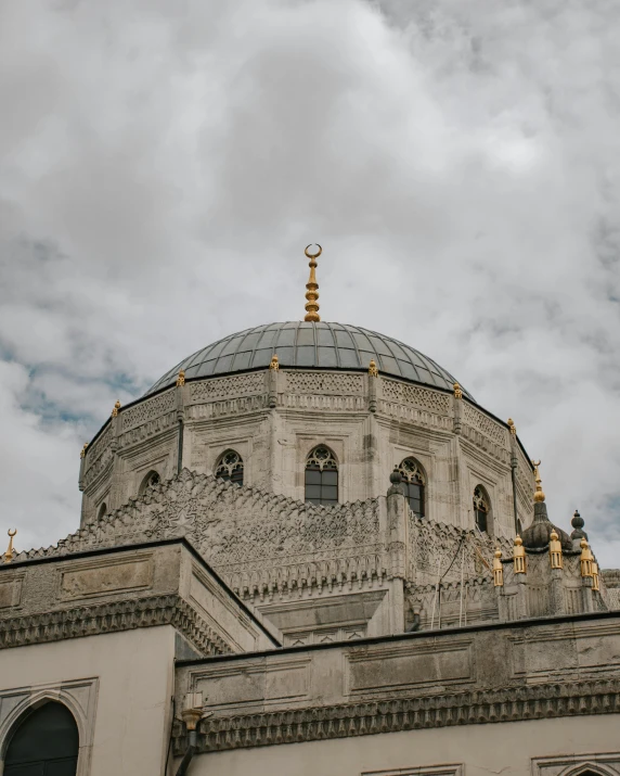 a large building with a gold dome on it