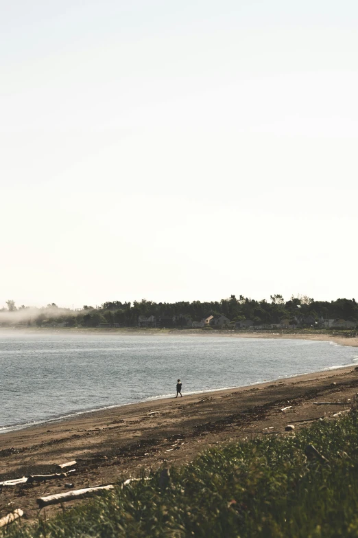 an ocean view is seen, with many waves