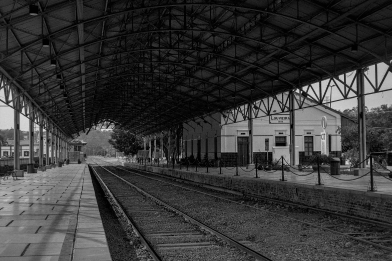 black and white po of a train station