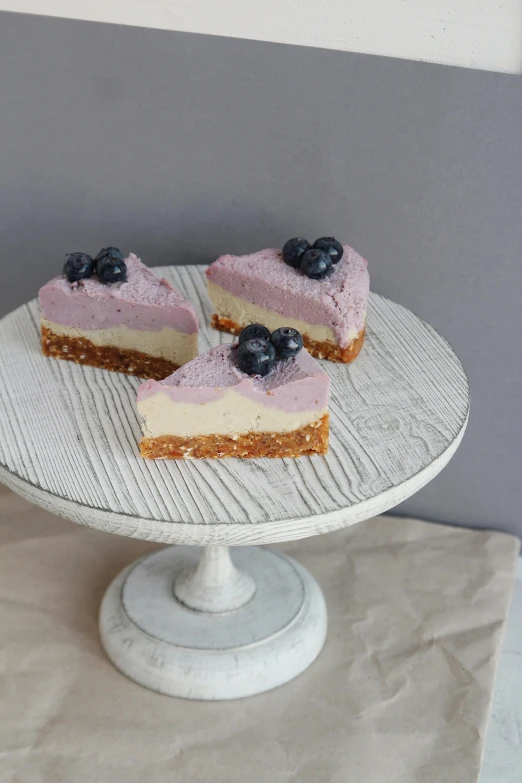 a couple of small desserts sitting on a plate