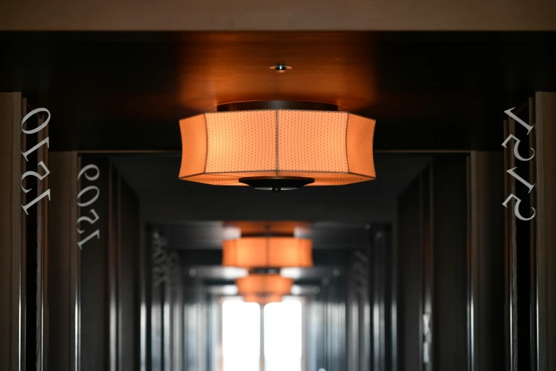 an up close picture of a hallway with lights