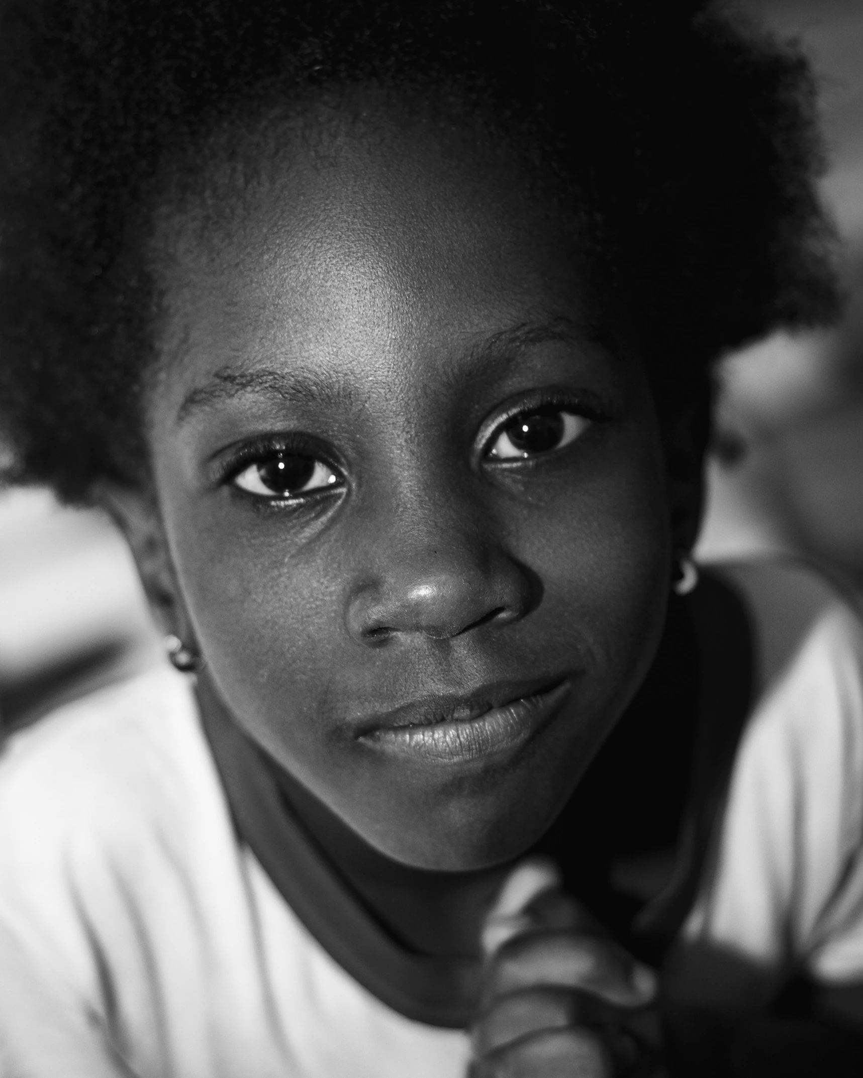 a close up view of a woman wearing a tie