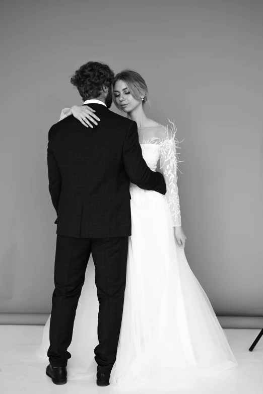 man and woman emce in black and white attire