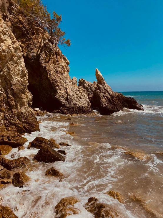 large rocks on the coast of an ocean