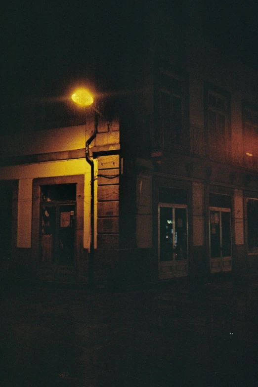 the front door of a building at night