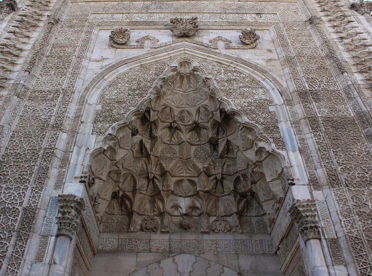 some sculptures on the side of a building