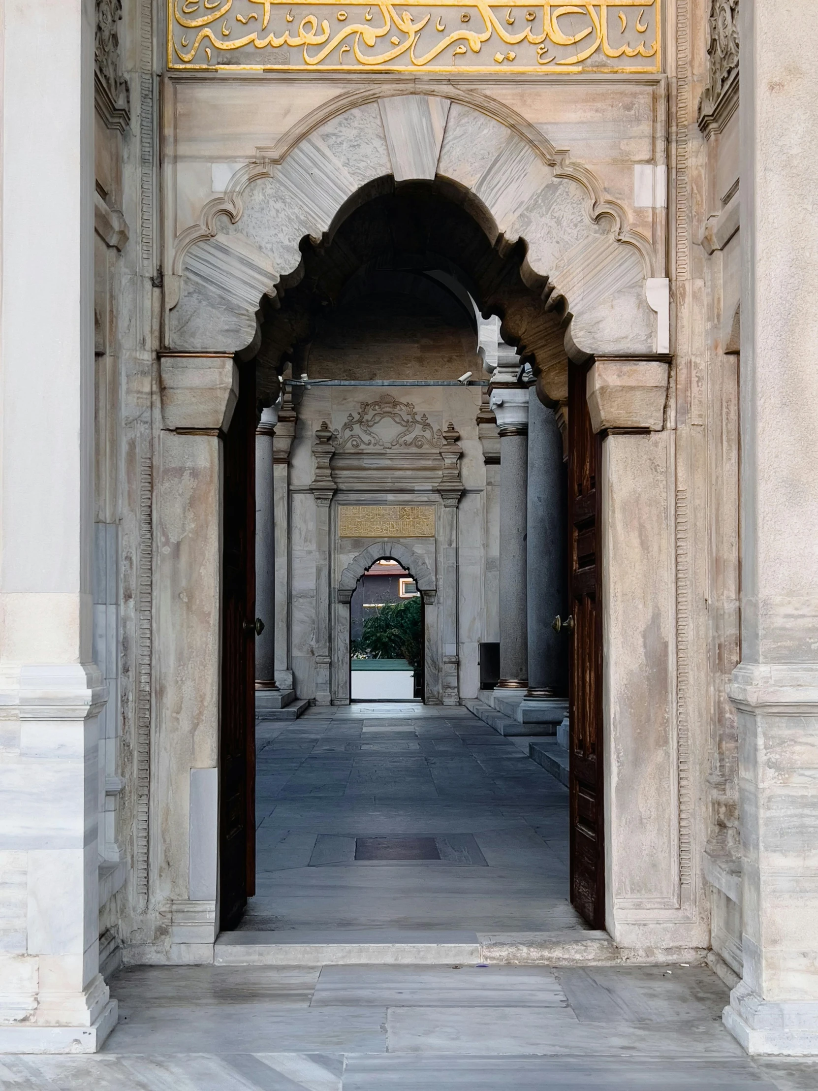 an intricate doorway leads to the other rooms