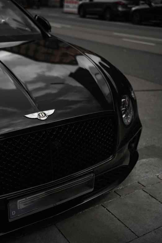 black sports car is parked on the street