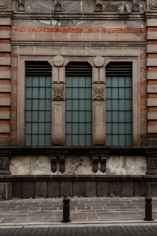 windows with a brick facade on a building