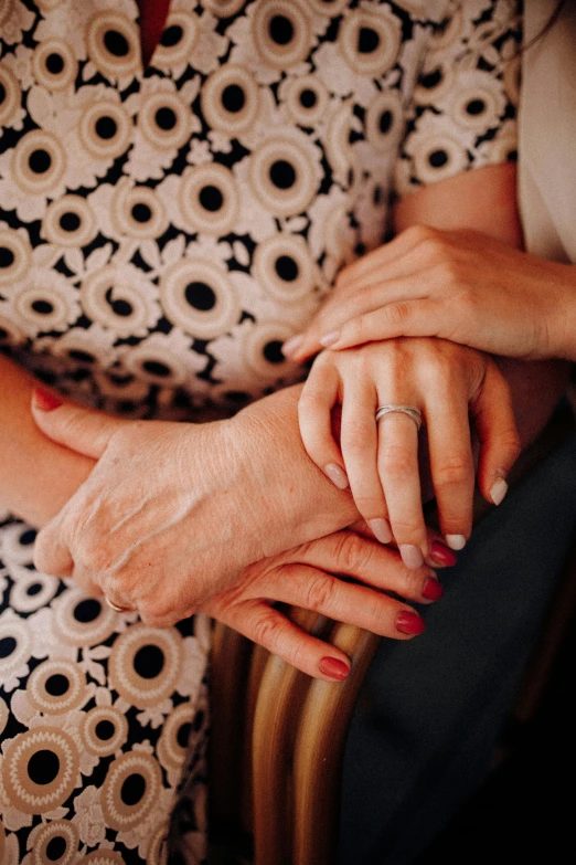 a man and woman are holding hands with each other