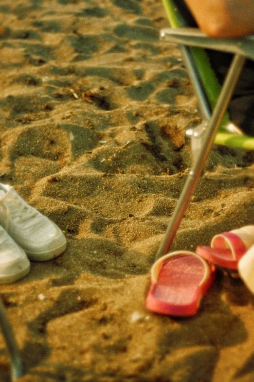 a man wearing sandals sitting at a table