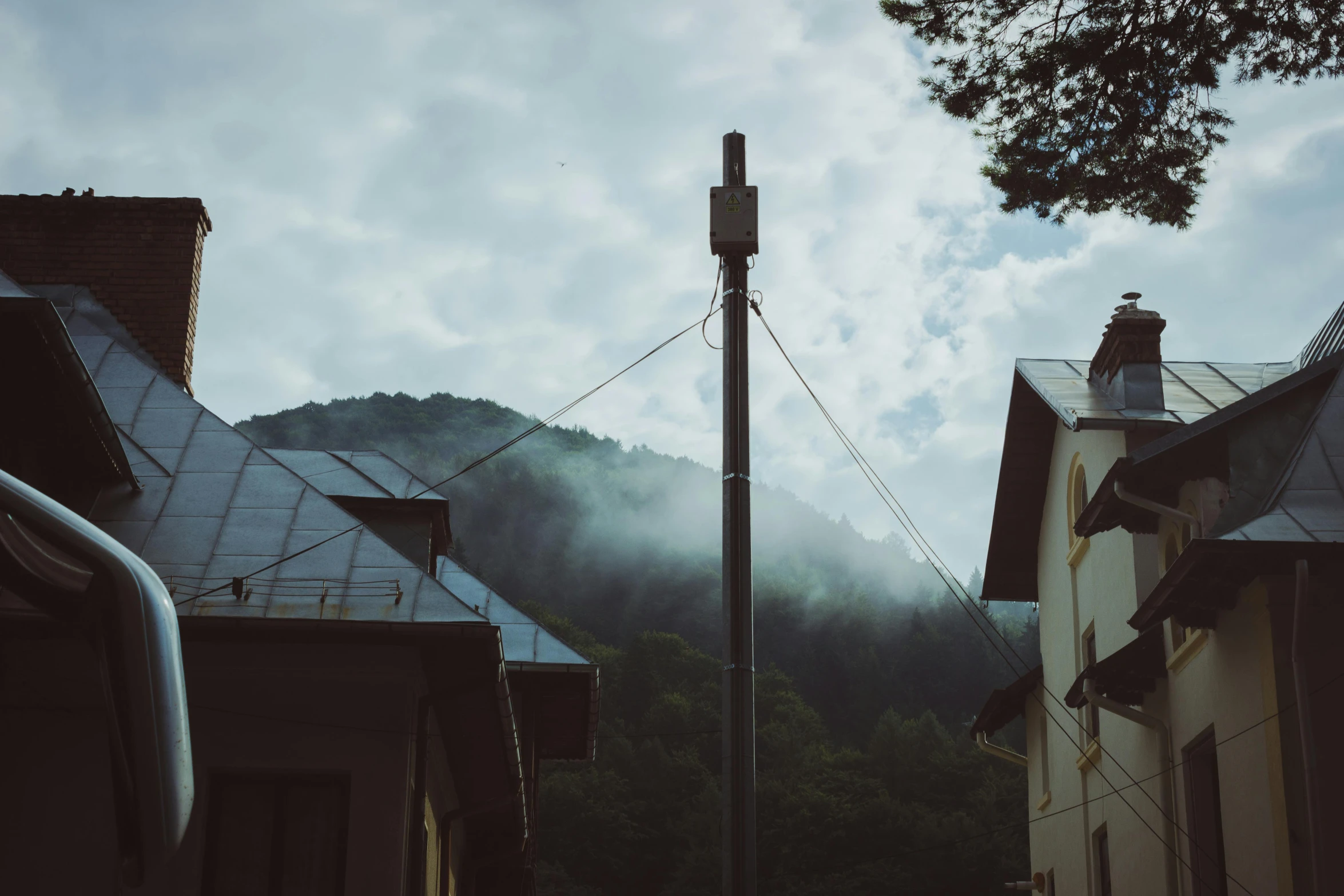 the smoke from the chimneys is coming out of a chimney