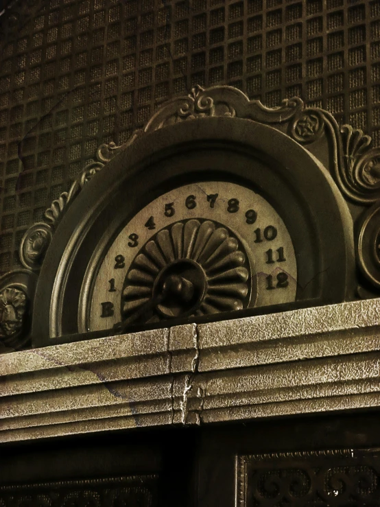 an intricately decorated clock on top of a building