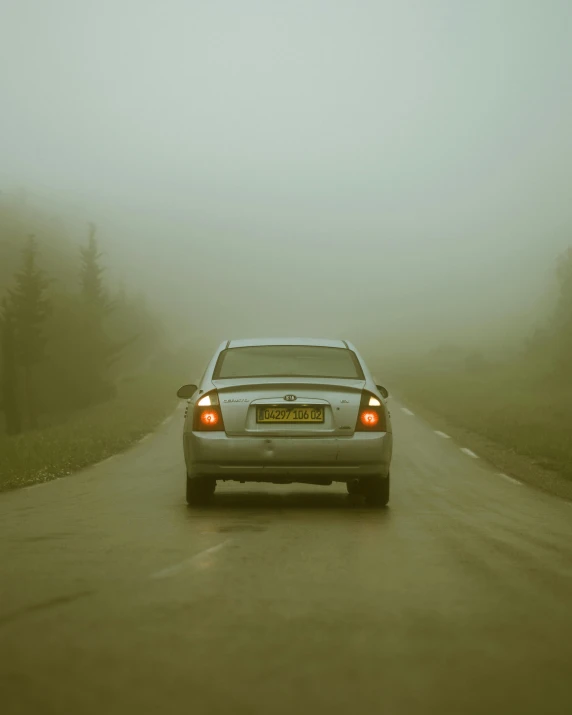 there is a car that is driving down the road