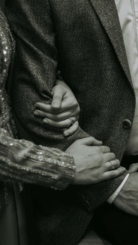 two people that are holding each other's hands