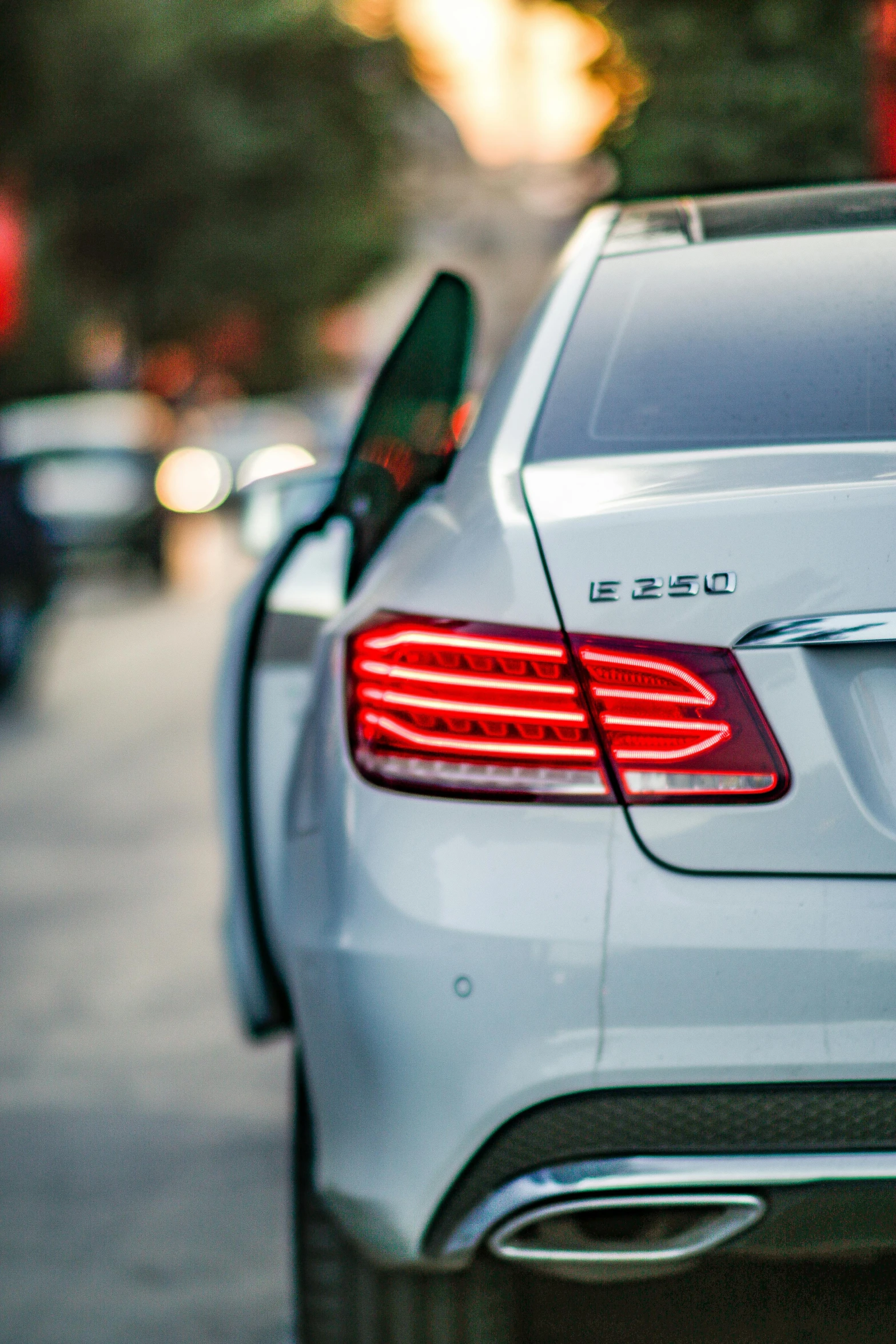 a mercedes benz c coupe parked in the street