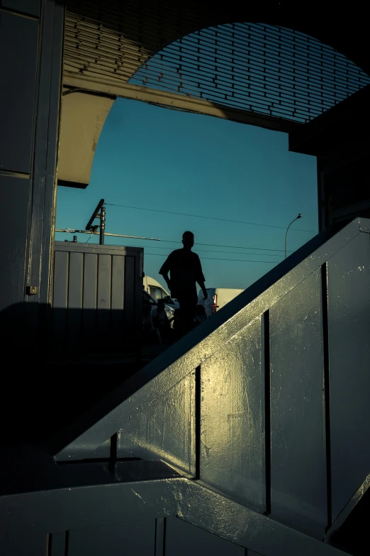 a person riding on the side of a set of stairs