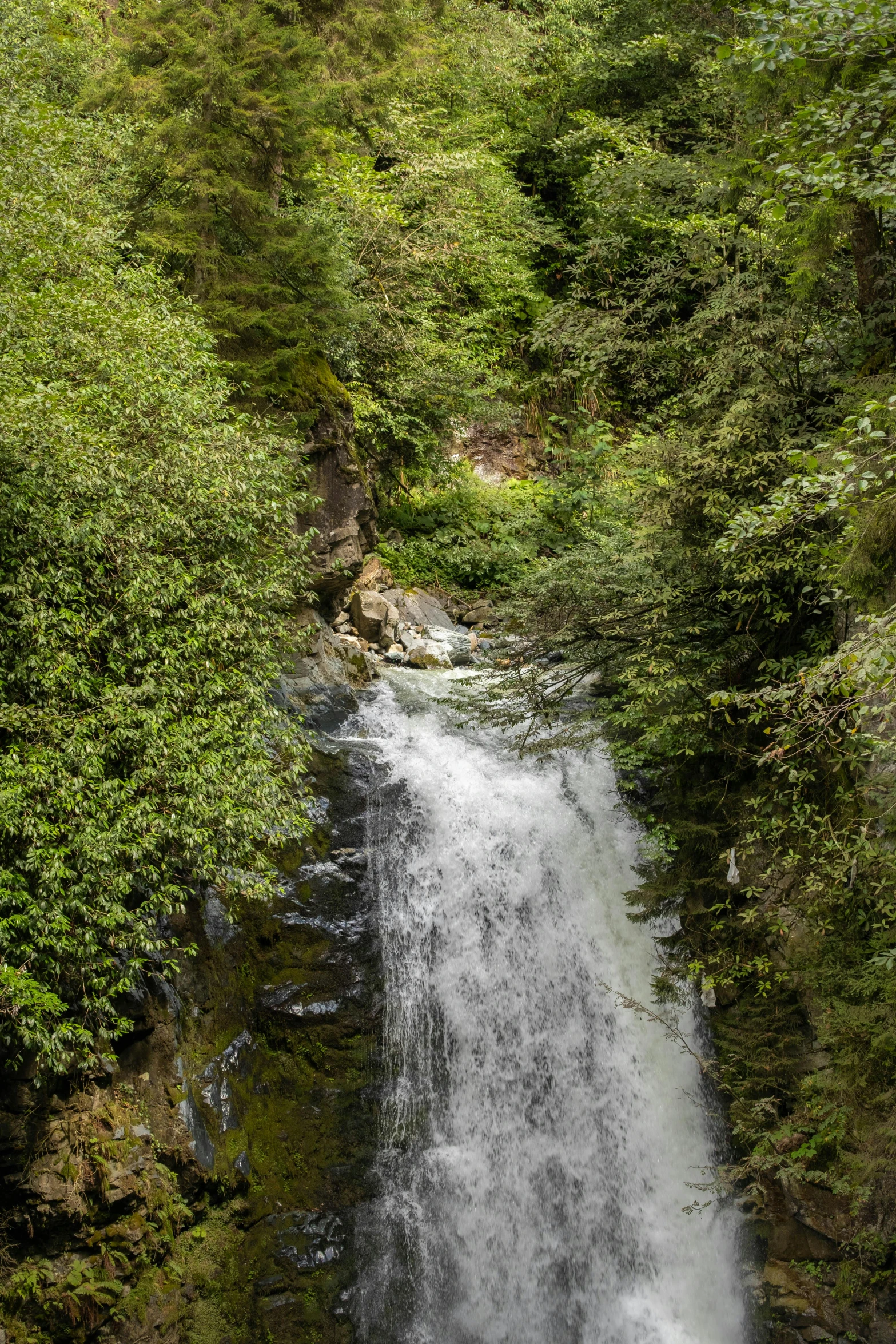 a large waterfall with some water in it