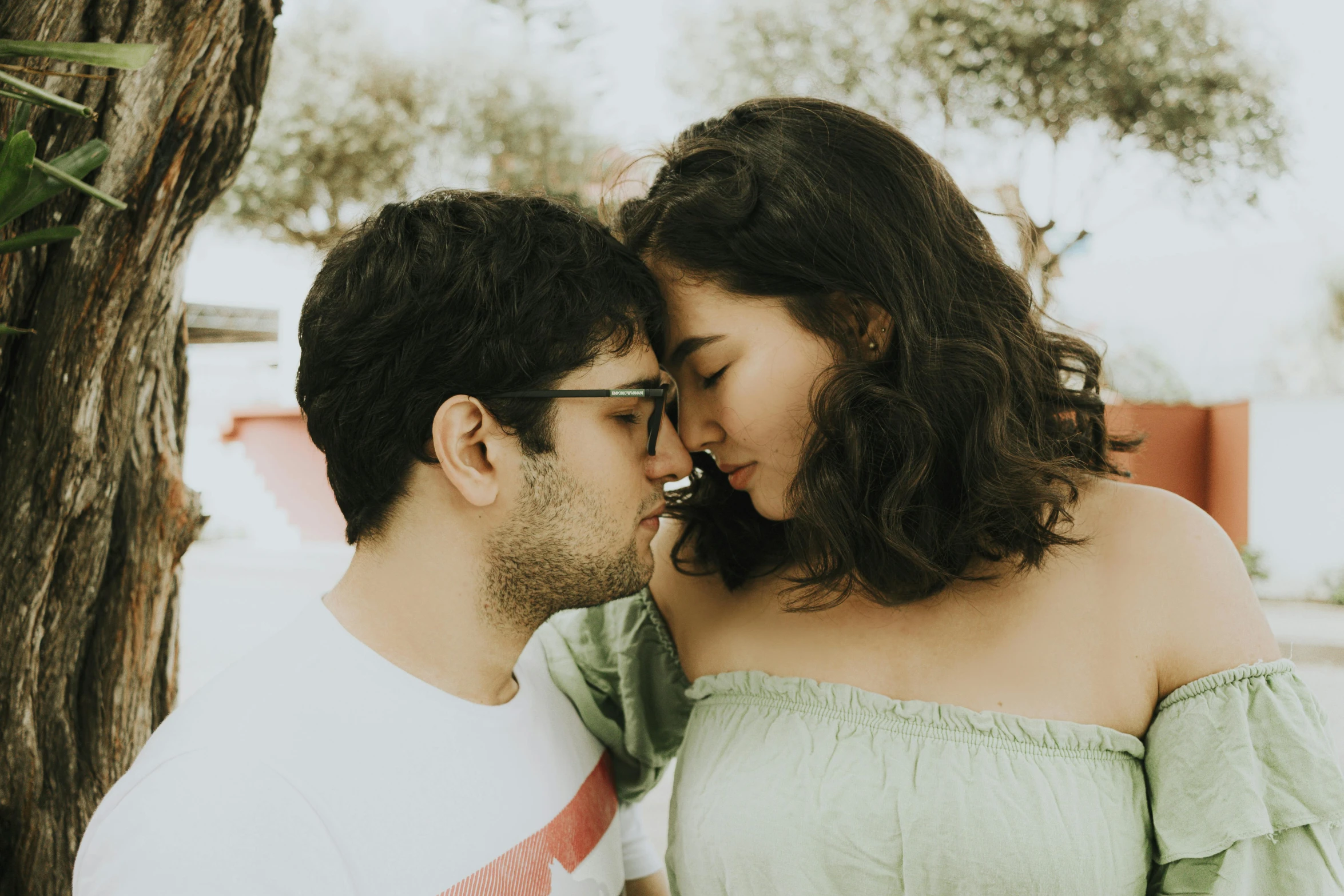 an image of couple looking into each other eyes