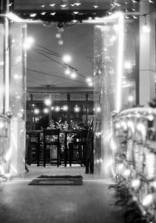 an open hallway covered in lights and decorated with lights