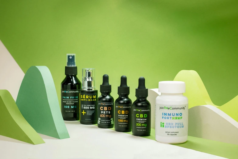 several bottles of hair products sitting on top of a white counter