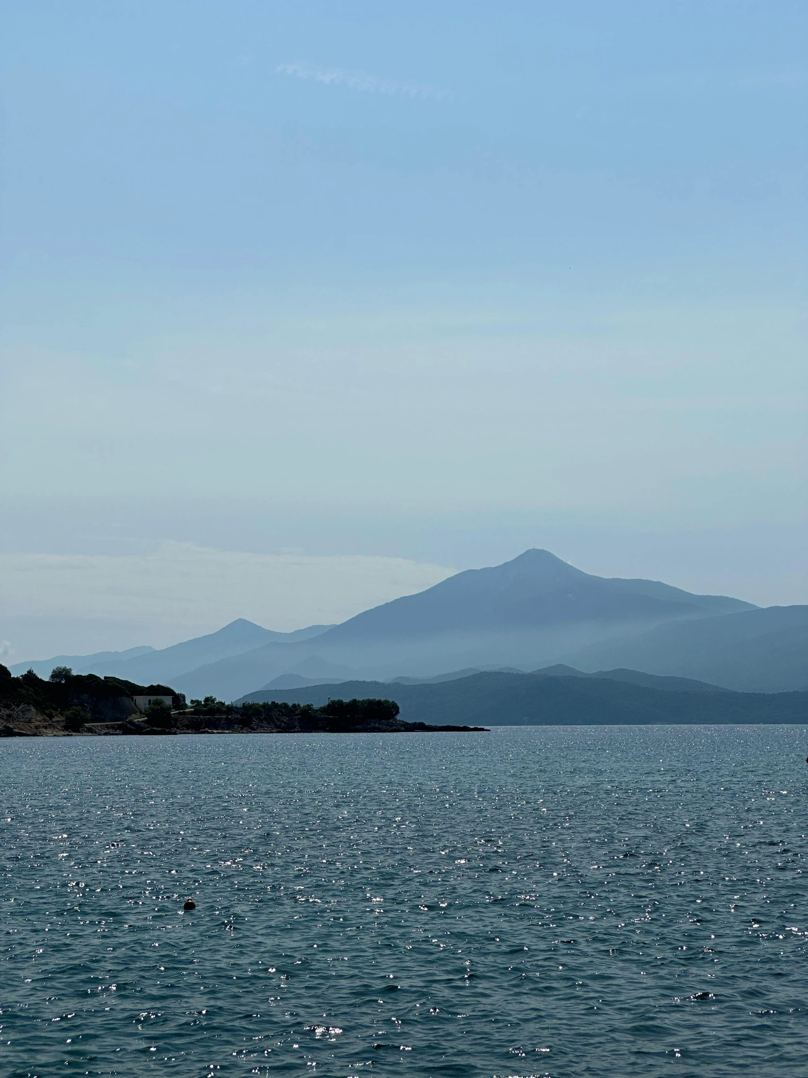 a boat traveling across a body of water